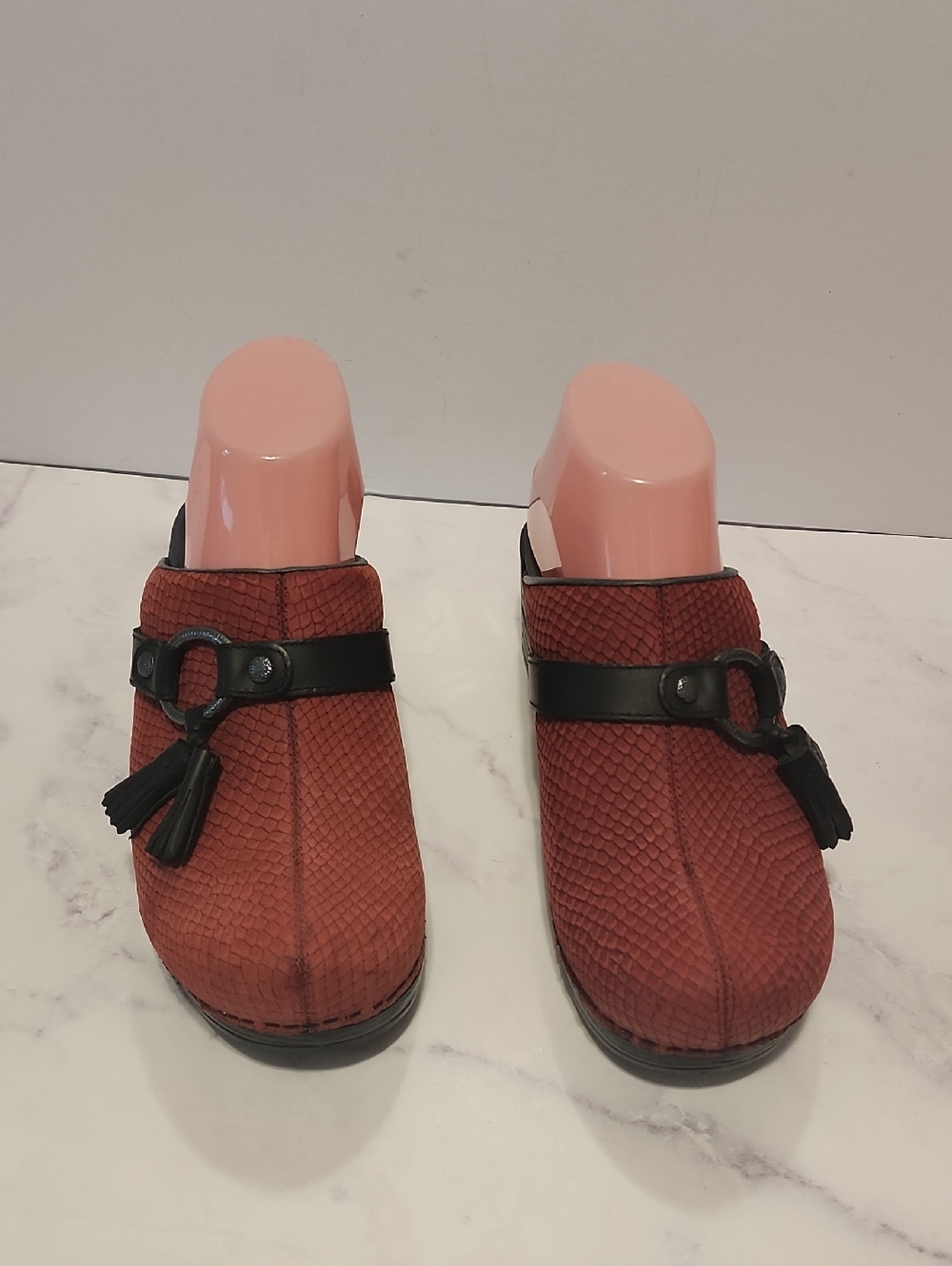 Dansko Red Textured Slip-On Clogs with Tassel Accent